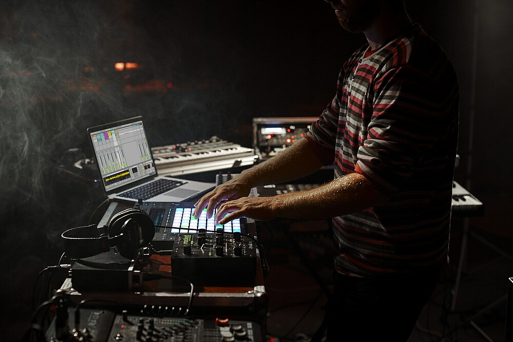 DJ using "Push" by Ableton, a music tech company from Berlin