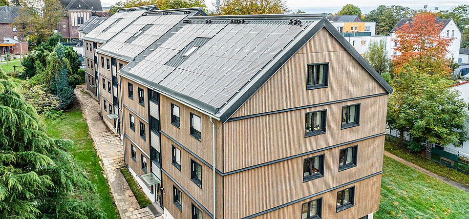 ecoworks net-zero panels on an apartment building.