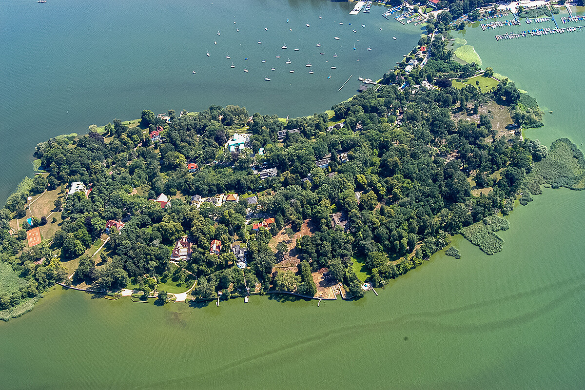 The island Schwanenwerder in the Havel River at the outlet of the Großer Wannsee Lake